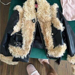 Black leather jacket with fur design, fleece inside